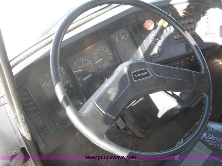 image for item I5551 1997 Volvo WGM25 flatbed truck