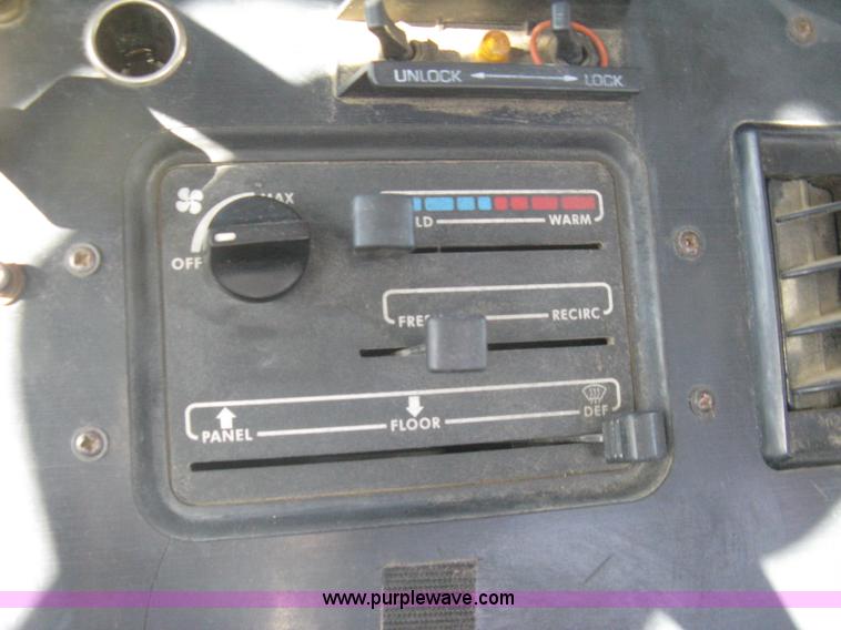 image for item I5551 1997 Volvo WGM25 flatbed truck