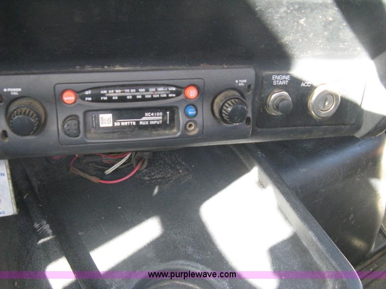 image for item I5551 1997 Volvo WGM25 flatbed truck