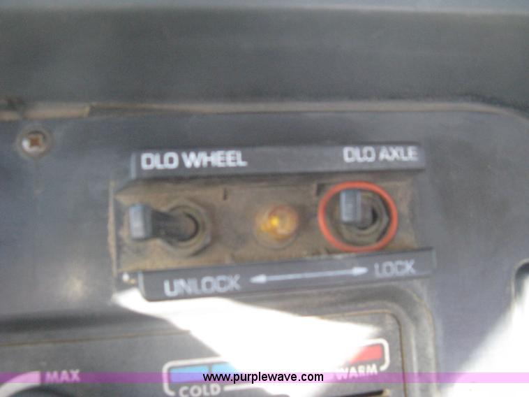 image for item I5551 1997 Volvo WGM25 flatbed truck