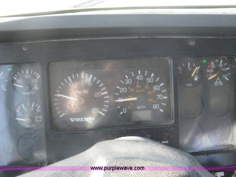 image for item I5551 1997 Volvo WGM25 flatbed truck