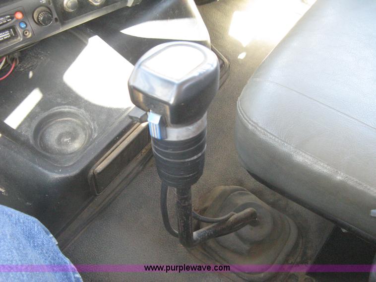 image for item I5551 1997 Volvo WGM25 flatbed truck