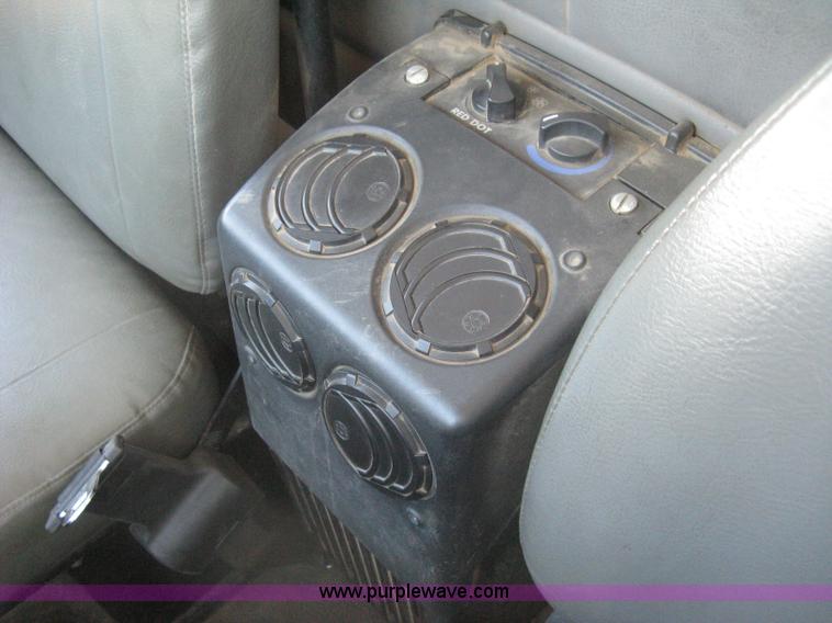 image for item I5551 1997 Volvo WGM25 flatbed truck