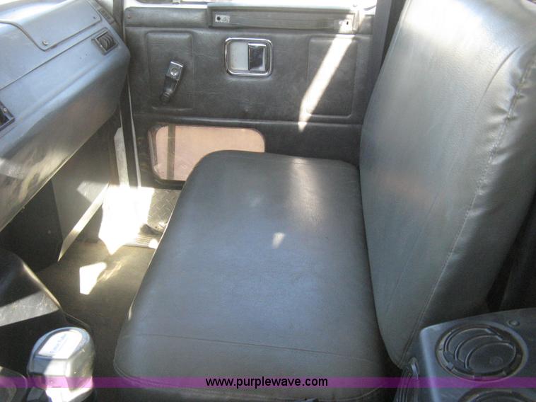 image for item I5551 1997 Volvo WGM25 flatbed truck