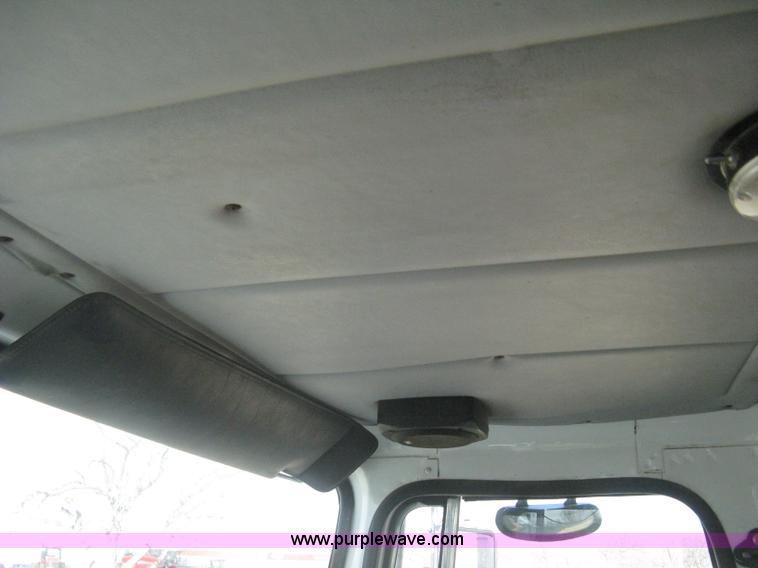 image for item I5551 1997 Volvo WGM25 flatbed truck