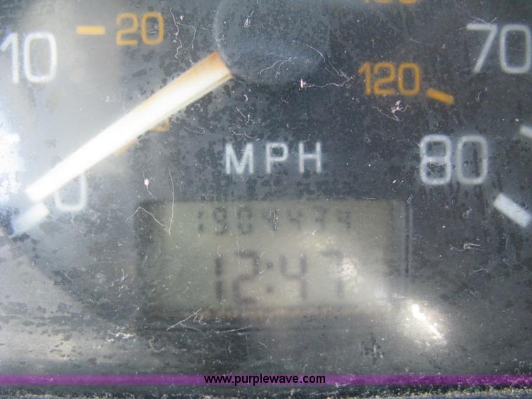 image for item I5551 1997 Volvo WGM25 flatbed truck