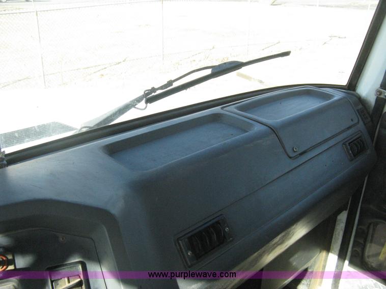 image for item I5551 1997 Volvo WGM25 flatbed truck