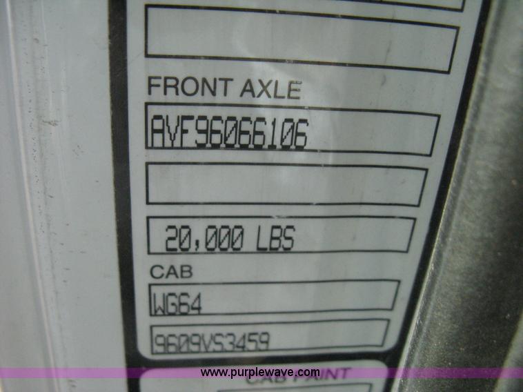 image for item I5551 1997 Volvo WGM25 flatbed truck