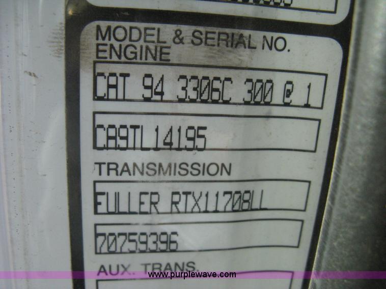 image for item I5551 1997 Volvo WGM25 flatbed truck