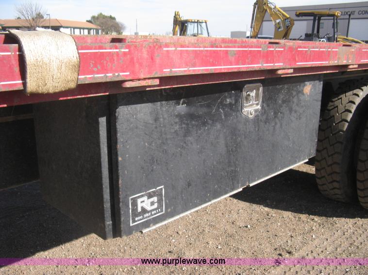 image for item I5551 1997 Volvo WGM25 flatbed truck