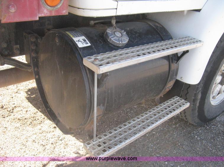 image for item I5551 1997 Volvo WGM25 flatbed truck