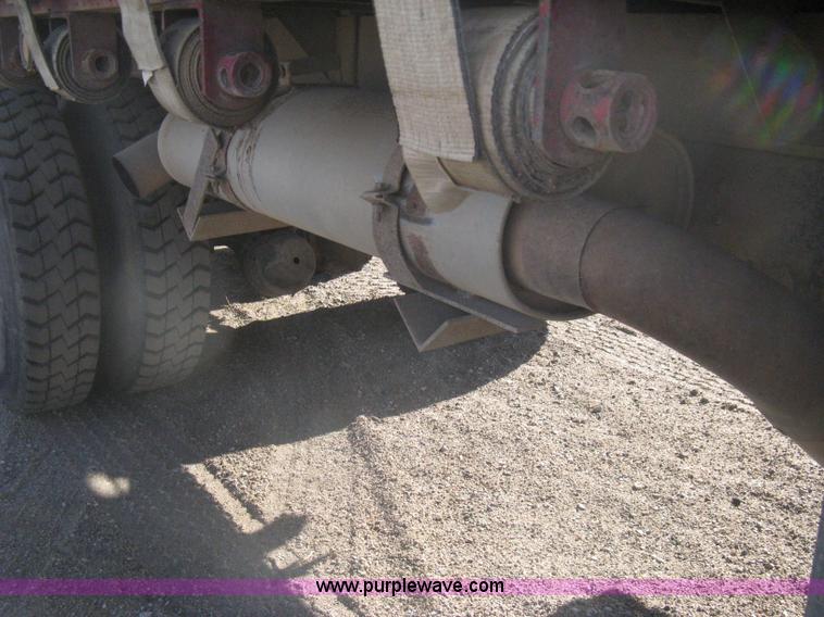 image for item I5551 1997 Volvo WGM25 flatbed truck