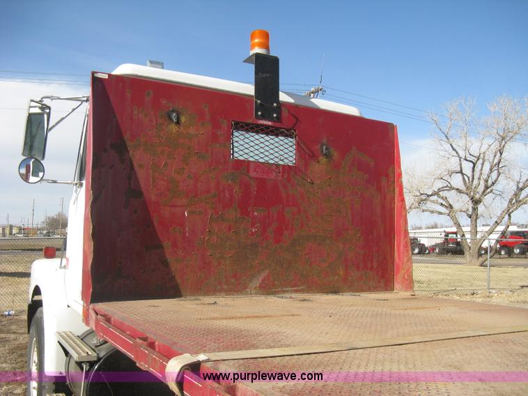 image for item I5551 1997 Volvo WGM25 flatbed truck