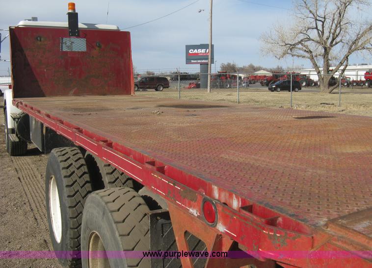 image for item I5551 1997 Volvo WGM25 flatbed truck