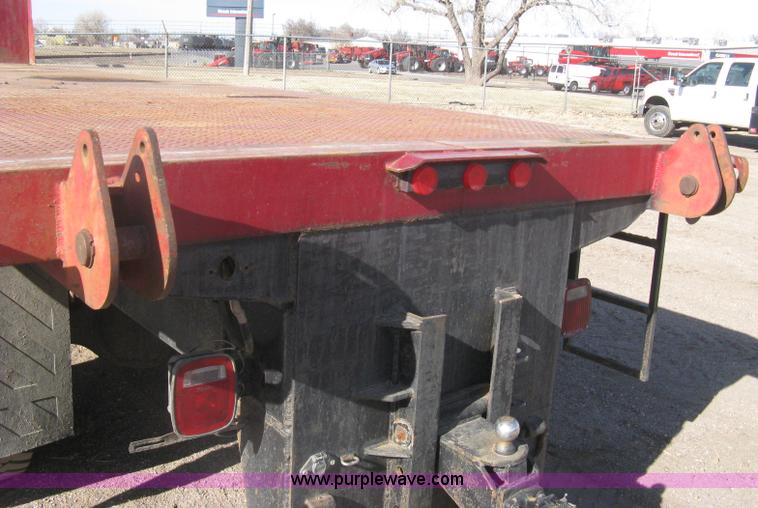 image for item I5551 1997 Volvo WGM25 flatbed truck