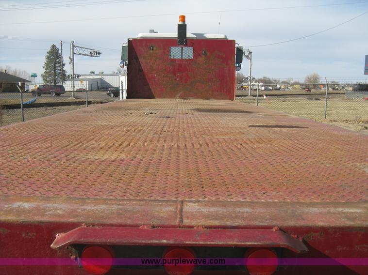 image for item I5551 1997 Volvo WGM25 flatbed truck