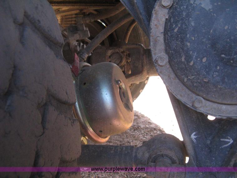 image for item I5551 1997 Volvo WGM25 flatbed truck