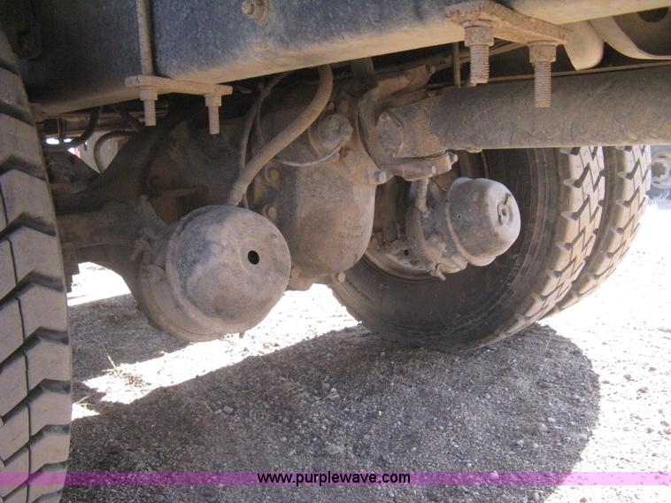 image for item I5551 1997 Volvo WGM25 flatbed truck