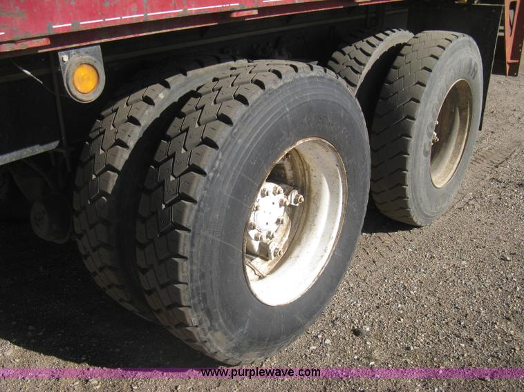 image for item I5551 1997 Volvo WGM25 flatbed truck