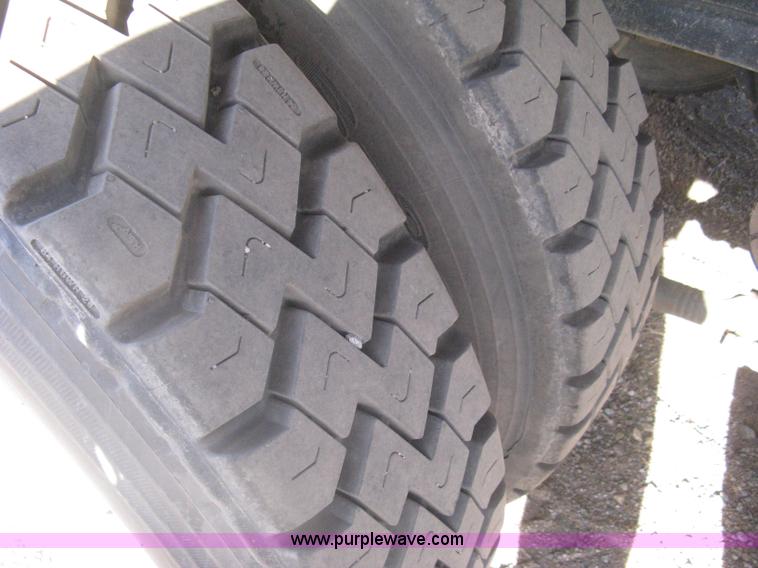 image for item I5551 1997 Volvo WGM25 flatbed truck