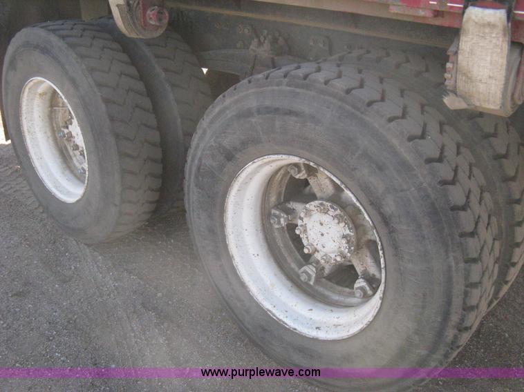 image for item I5551 1997 Volvo WGM25 flatbed truck