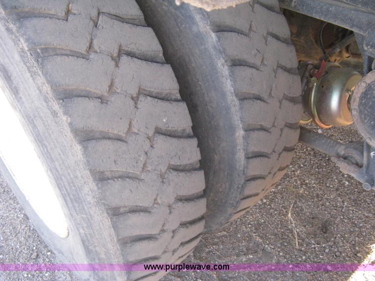 image for item I5551 1997 Volvo WGM25 flatbed truck