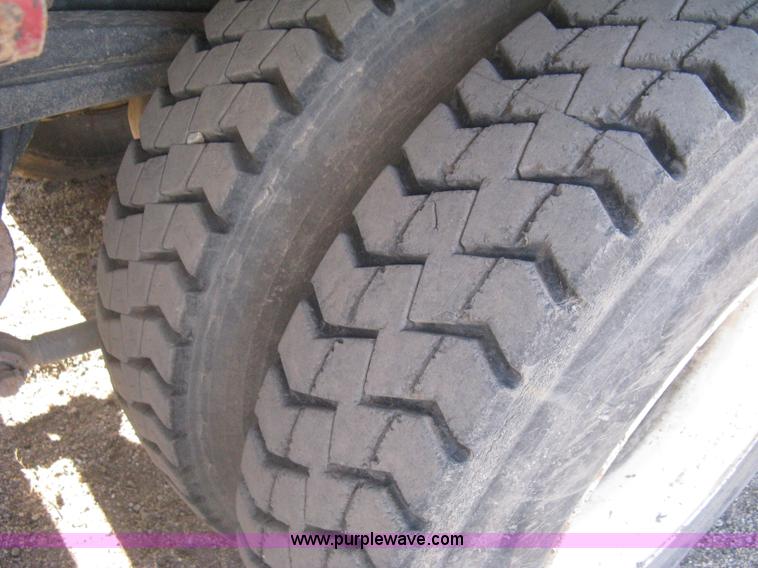 image for item I5551 1997 Volvo WGM25 flatbed truck