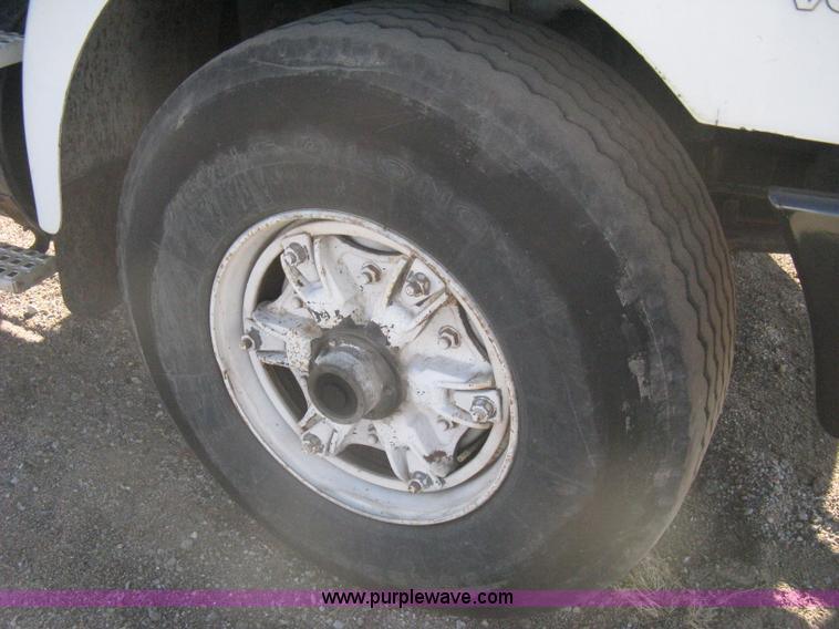 image for item I5551 1997 Volvo WGM25 flatbed truck