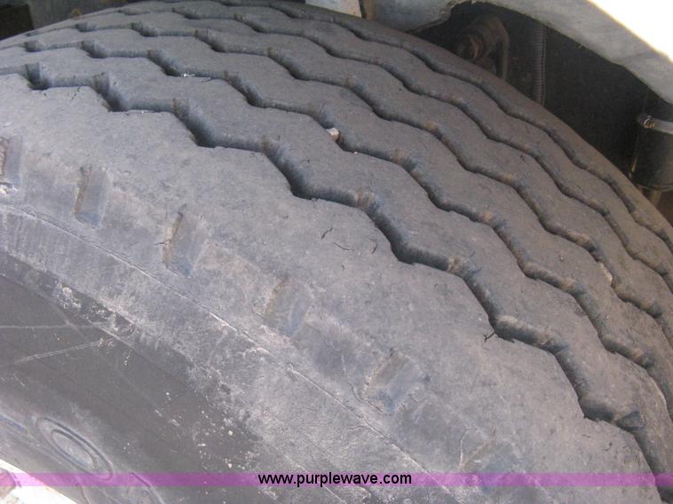 image for item I5551 1997 Volvo WGM25 flatbed truck