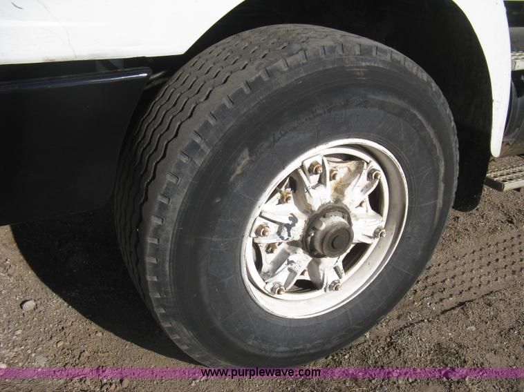 image for item I5551 1997 Volvo WGM25 flatbed truck