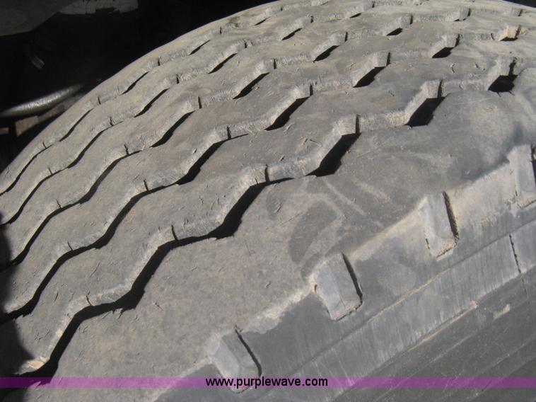 image for item I5551 1997 Volvo WGM25 flatbed truck