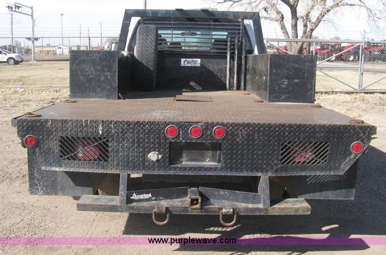 image for item I5555 2009 Ford F350 Super Duty XL Crew Cab flatbed truck