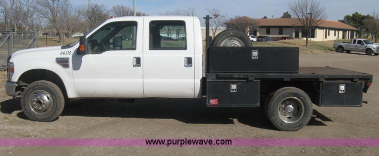 image for item I5555 2009 Ford F350 Super Duty XL Crew Cab flatbed truck
