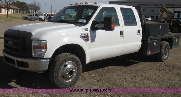 image for item I5555 2009 Ford F350 Super Duty XL Crew Cab flatbed truck