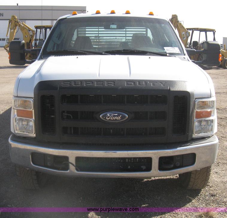 image for item I5555 2009 Ford F350 Super Duty XL Crew Cab flatbed truck