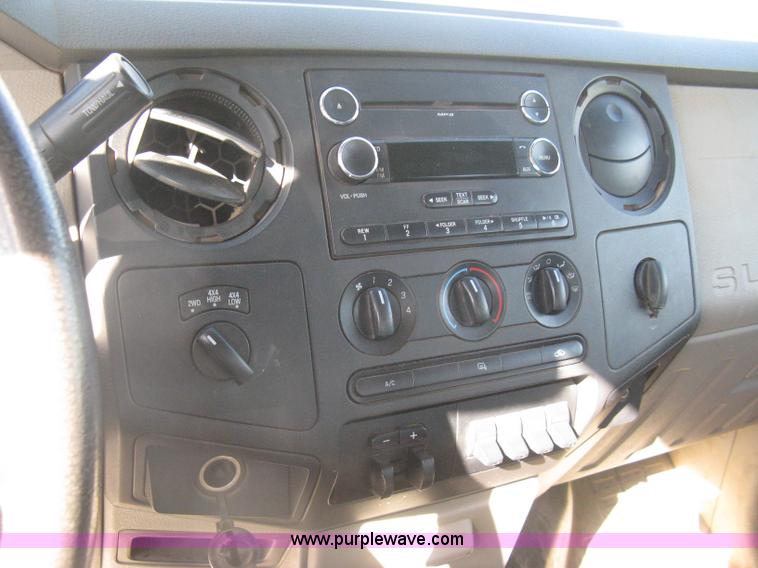 image for item I5555 2009 Ford F350 Super Duty XL Crew Cab flatbed truck