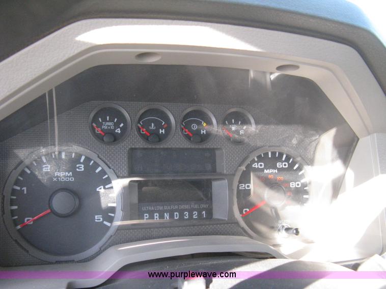 image for item I5555 2009 Ford F350 Super Duty XL Crew Cab flatbed truck