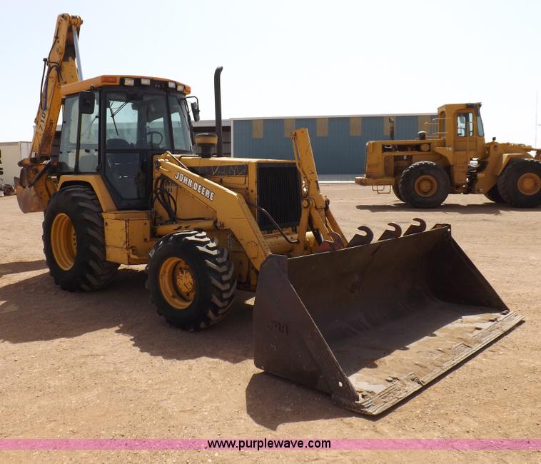 image for item I9005 1993 John Deere 710D backhoe