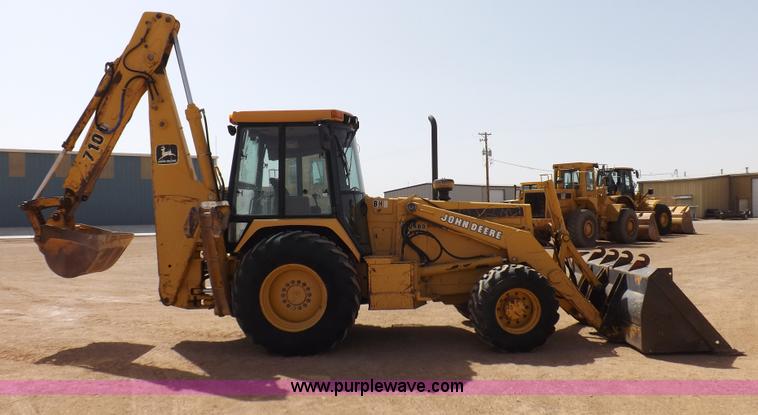 image for item I9005 1993 John Deere 710D backhoe