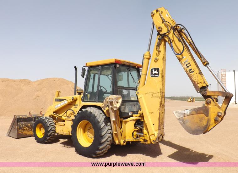 image for item I9005 1993 John Deere 710D backhoe