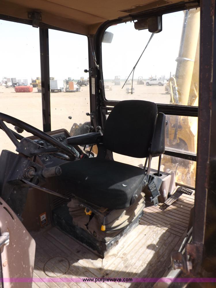 image for item I9005 1993 John Deere 710D backhoe