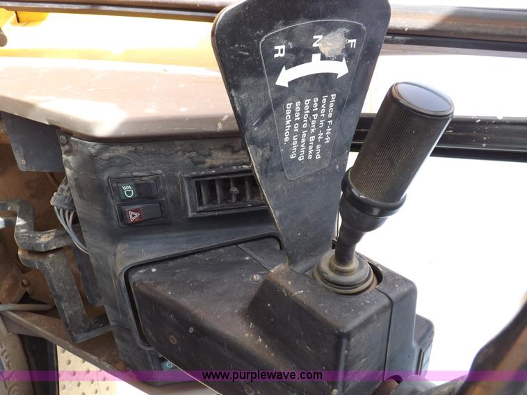 image for item I9005 1993 John Deere 710D backhoe