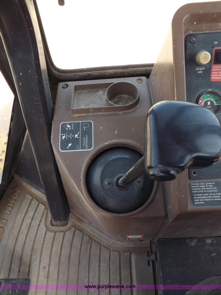 image for item I9005 1993 John Deere 710D backhoe