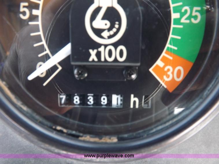 image for item I9005 1993 John Deere 710D backhoe