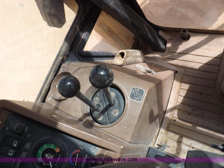 image for item I9005 1993 John Deere 710D backhoe