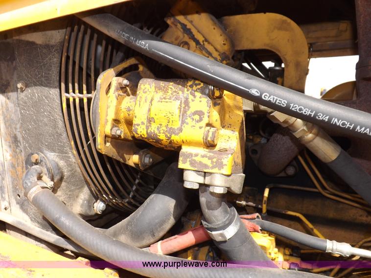 image for item I9005 1993 John Deere 710D backhoe