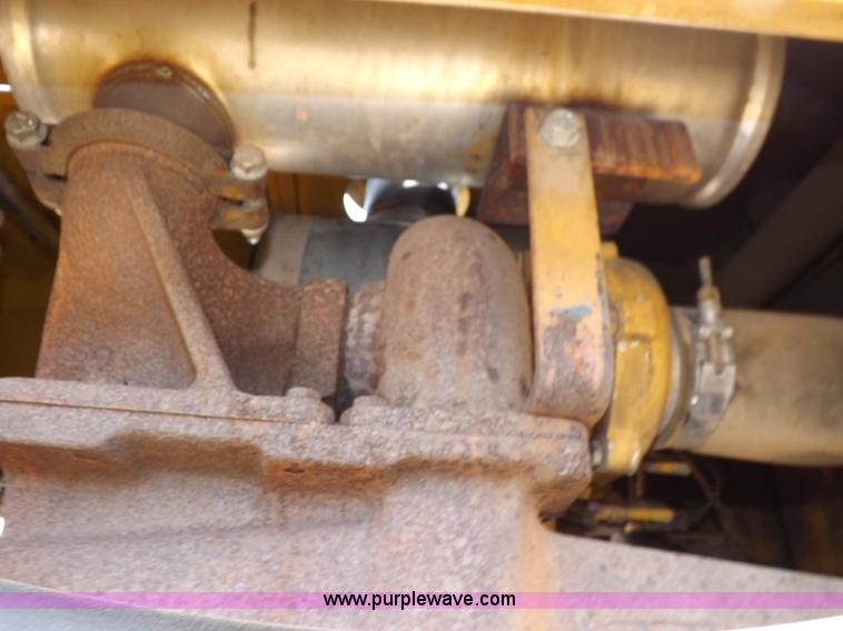 image for item I9005 1993 John Deere 710D backhoe