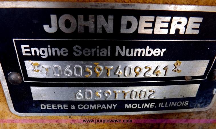 image for item I9005 1993 John Deere 710D backhoe