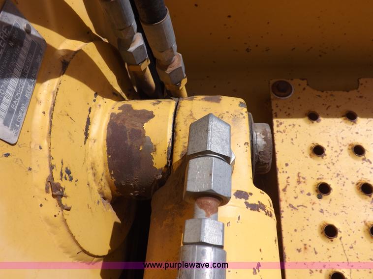 image for item I9005 1993 John Deere 710D backhoe