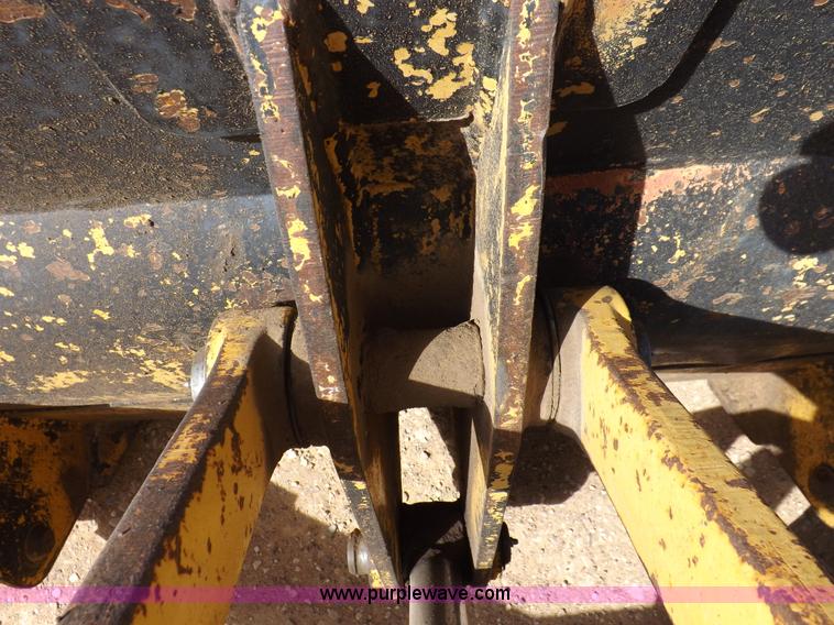 image for item I9005 1993 John Deere 710D backhoe